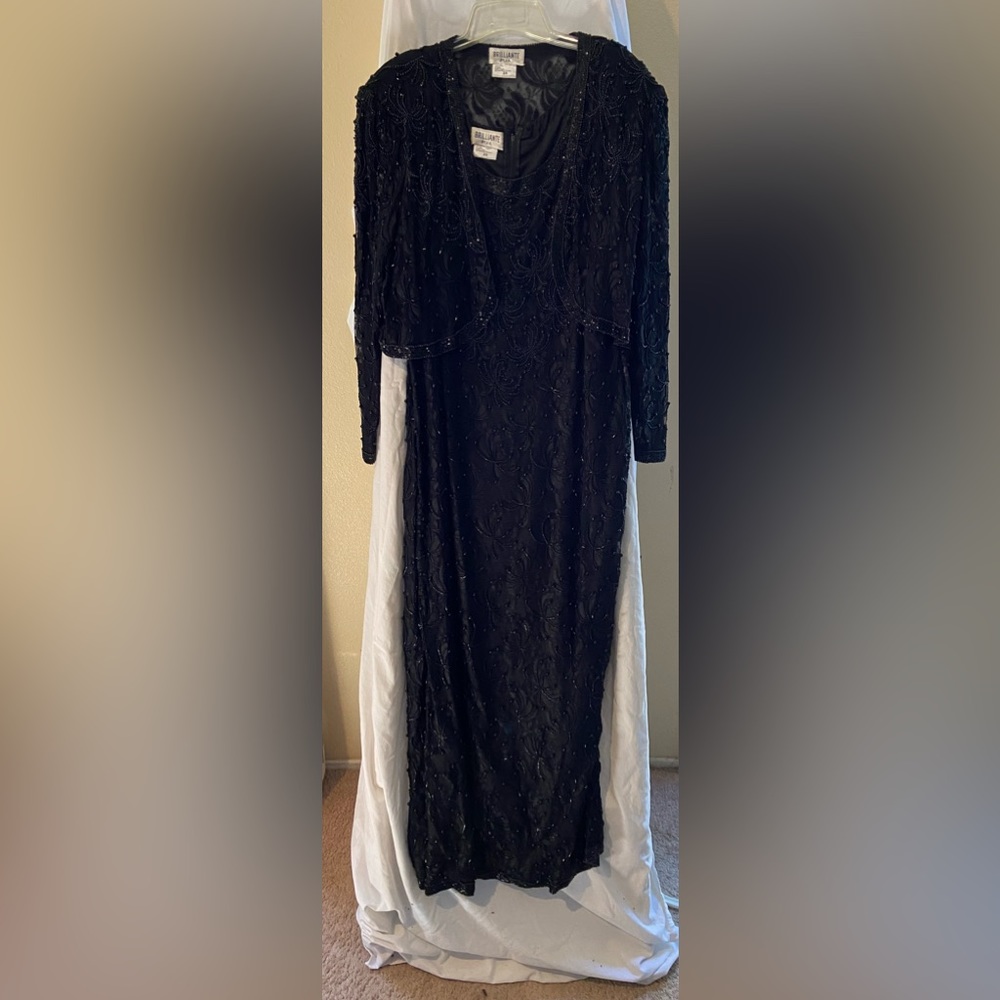 Plus size formal black beaded gown and jacket.size 22